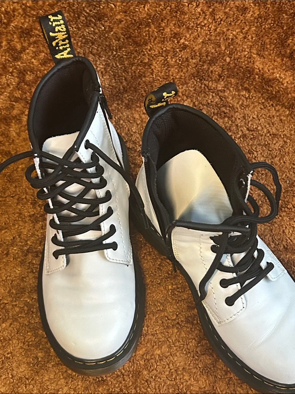 Dr. Martens White Leather Ankle Boots with Black Sole and Trim